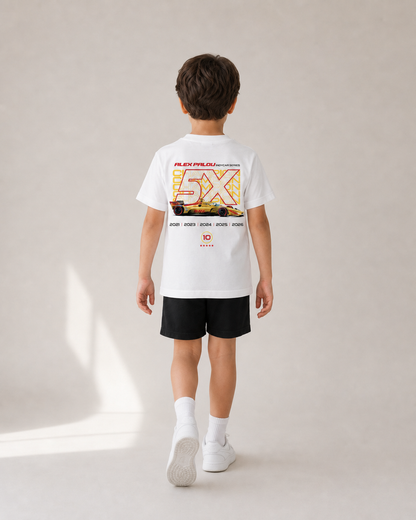 Young child walking away in the KIDS Champion Tee — studio mockup